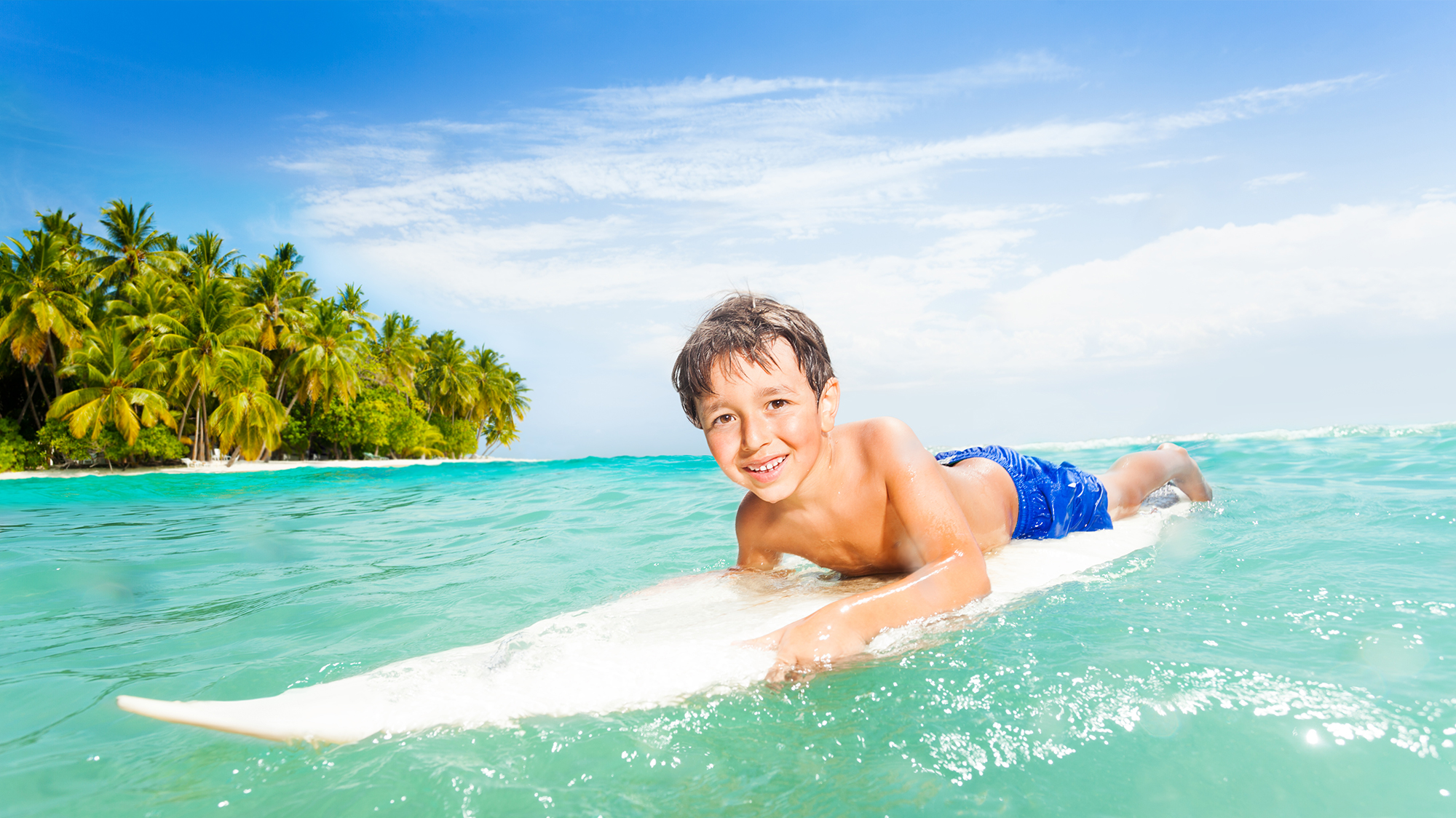 Young boy on a surfboard