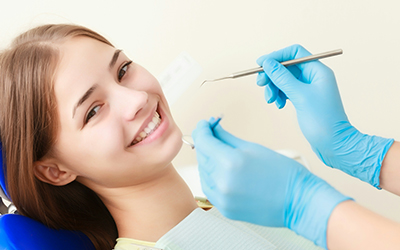 Young woman in dentist office