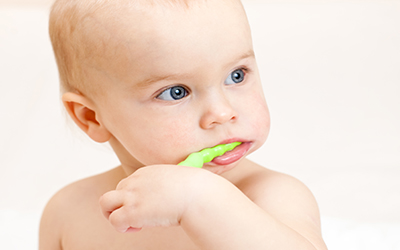 Toddler brushing teeth