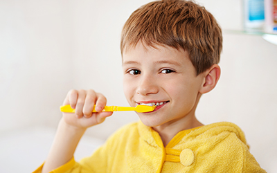Young child with a toothbrush
